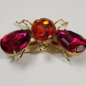 Mid-Century Gold-Tone Flying Insect Brooch with Magenta Teardrop Wings